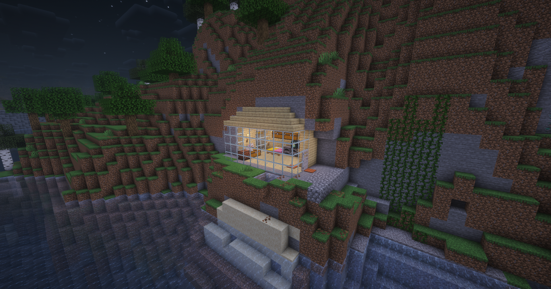 Maison Minecraft construite dans une montagne au bord de l’eau